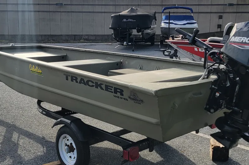 The Image of 2007 Tracker Grizzly 1448 AWL boat on trailer with Mercury outboard motor. - 0