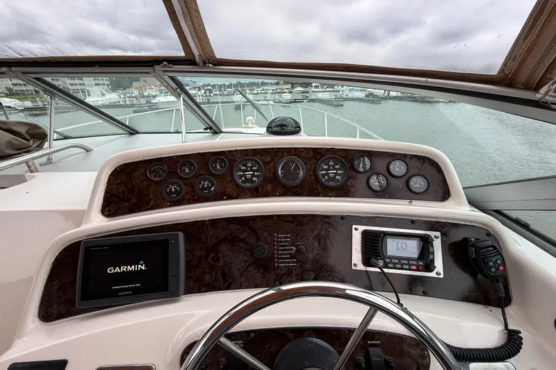 Slide: The Image of Cockpit view of 1998 Wellcraft 3200 Martinique with Garmin navigation system. - 23
