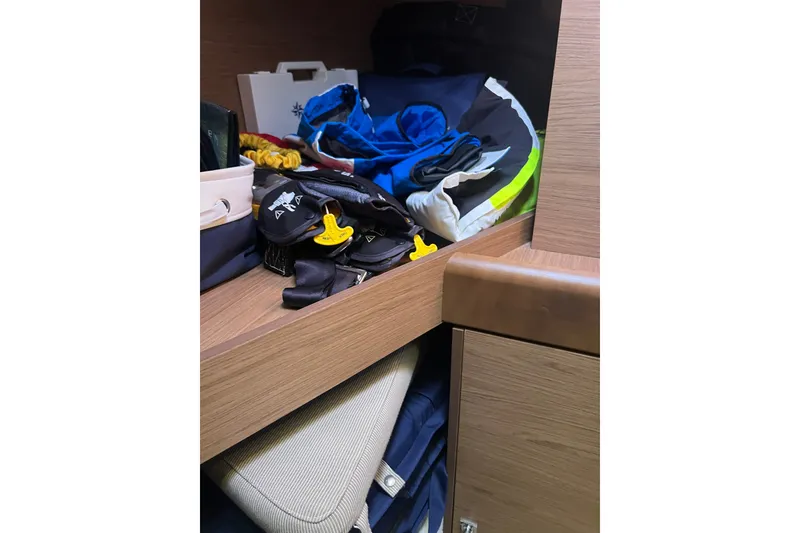 Slide: The Image of Storage compartment on a 2013 Jeanneau Sun Odyssey 44 DS yacht with sailing gear. - 20