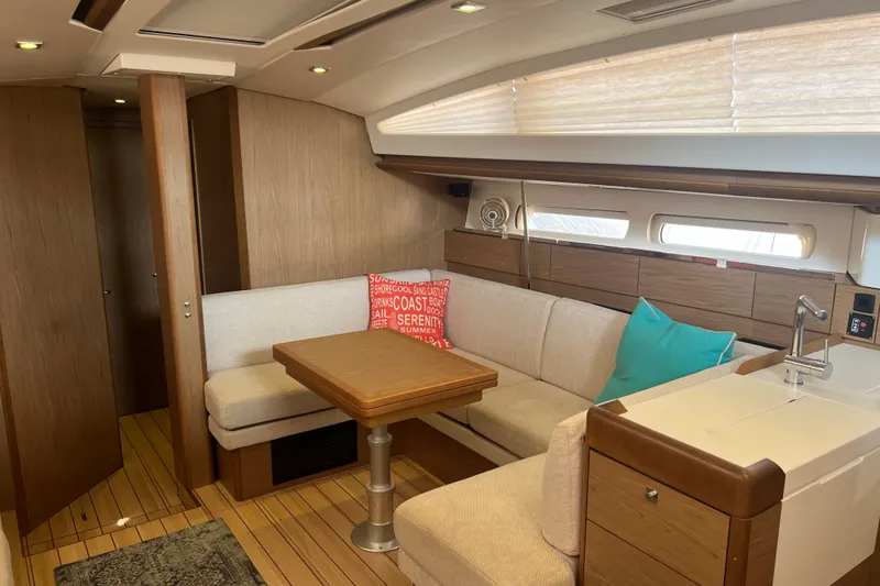 Slide: The Image of Interior of 2013 Jeanneau Sun Odyssey 44 DS yacht with cozy seating and modern design. - 28