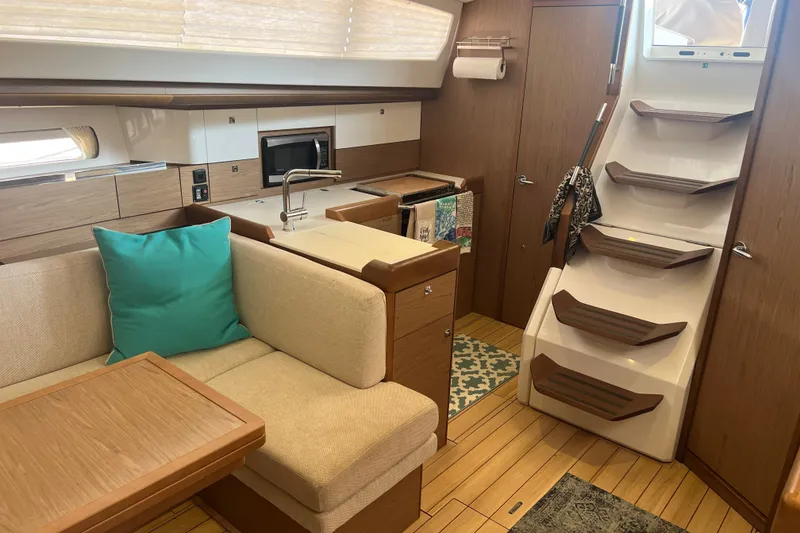 Slide: The Image of Interior of 2013 Jeanneau Sun Odyssey 44 DS yacht with modern kitchen and seating area. - 27