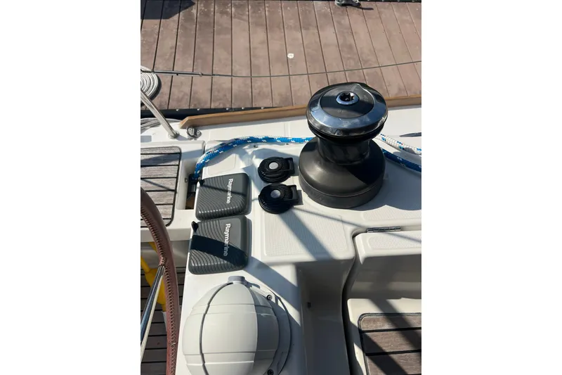Slide: The Image of Deck of 2013 Jeanneau Sun Odyssey 44 DS with winch and Raymarine controls. - 35