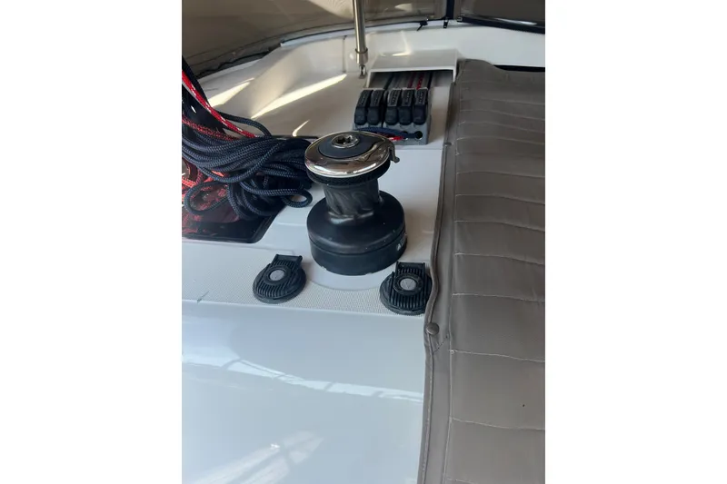 Slide: The Image of Deck view of 2013 Jeanneau Sun Odyssey 44 DS sailboat with winch and ropes. - 33