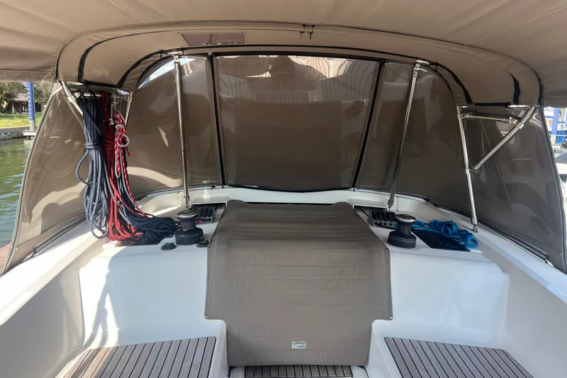 Slide: The Image of Cockpit of 2013 Jeanneau Sun Odyssey 44 DS sailboat with ropes and winches. - 8