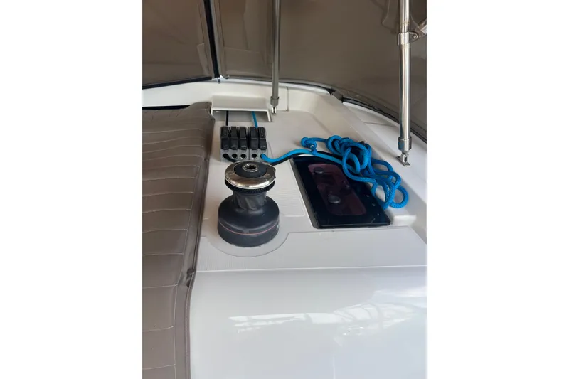 Slide: The Image of Deck of 2013 Jeanneau Sun Odyssey 44 DS with winch and blue rope. - 31
