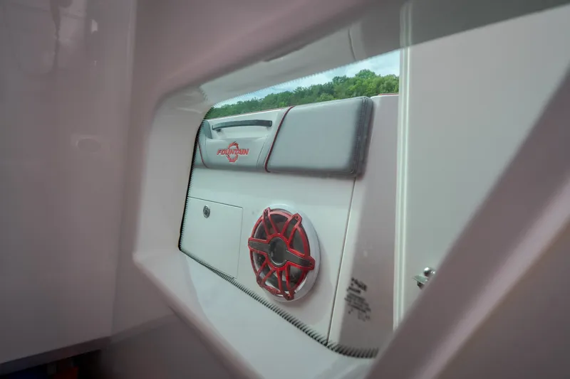Slide: The Image of 2024 Fountain 38 SCX boat interior with speaker and logo detail. - 43