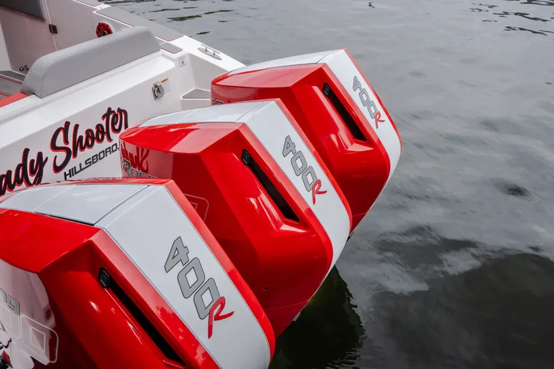 Slide: The Image of 2024 Fountain 38 SCX boat with triple 400R outboard engines on water. - 16