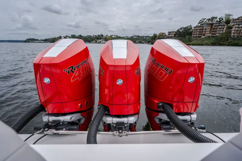 Slide: The Image of Triple red Mercury Racing 400 outboard engines on a 2024 Fountain 38 SCX boat. - 21