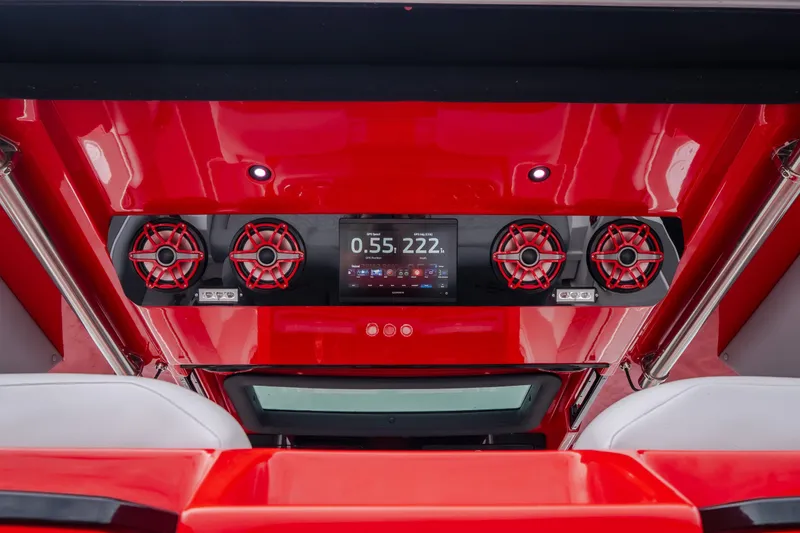 Slide: The Image of 2024 Fountain 38 SCX boat interior with red speakers and digital display. - 30