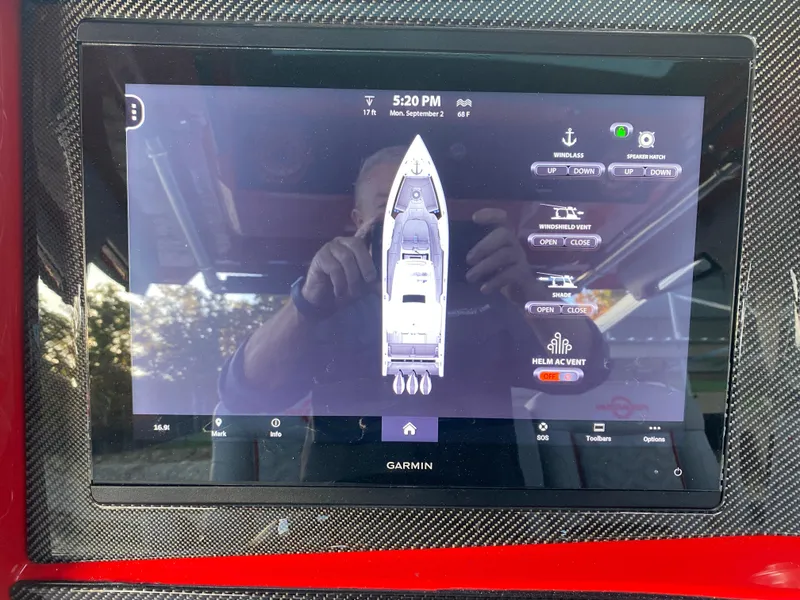 Slide: The Image of Garmin display on 2024 Fountain 38 SCX boat, showing navigation and control interface. - 25