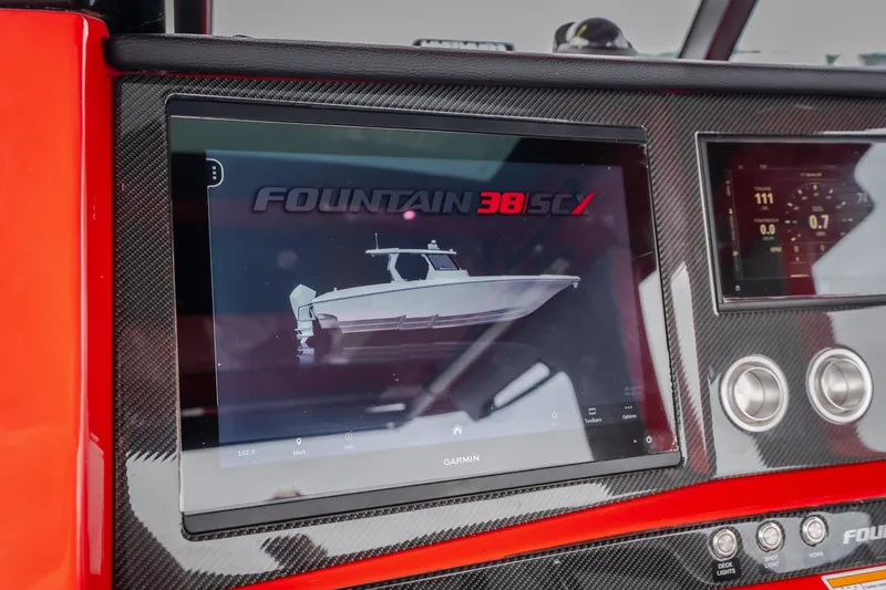 Slide: The Image of Dashboard display of 2024 Fountain 38 SCX boat with digital controls. - 64