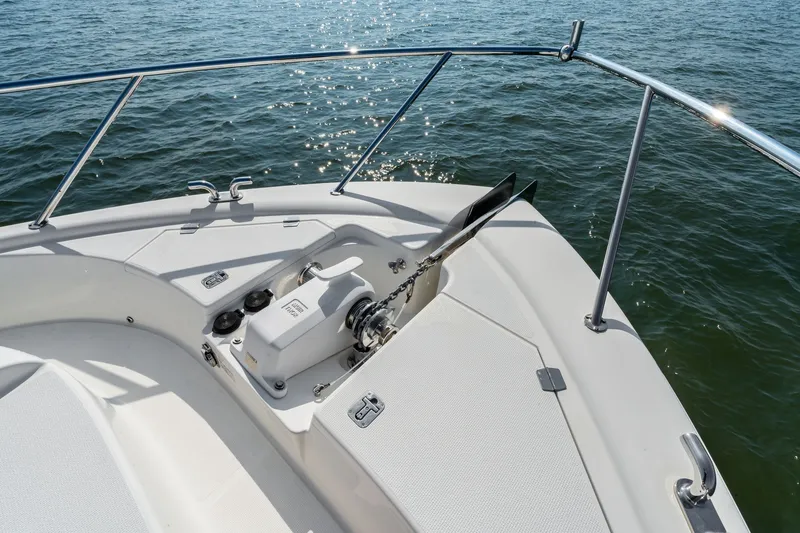 Slide: The Image of Bow of 2016 Maritimo M58 yacht with anchor and railing on open water. - 15