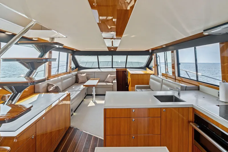 Slide: The Image of Luxurious interior of 2016 Maritimo M58 yacht with modern kitchen and seating area. - 30