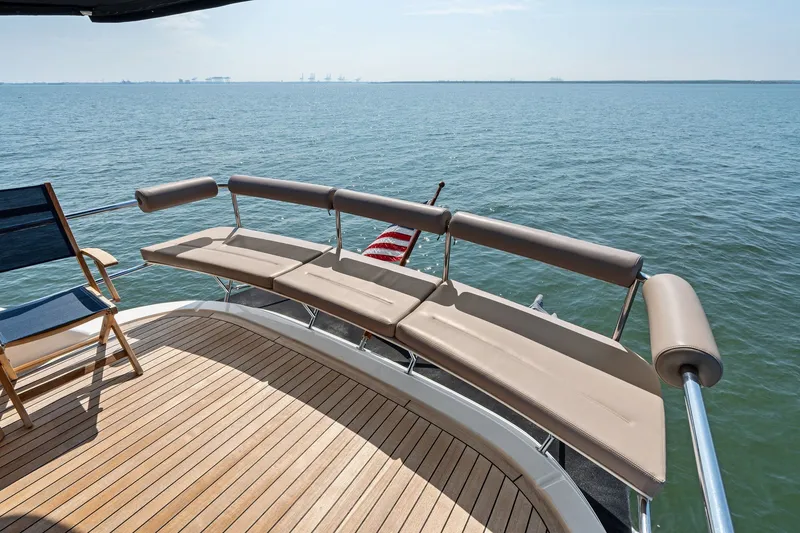Slide: The Image of Luxury deck of 2016 Maritimo M58 yacht with ocean view and seating. - 18