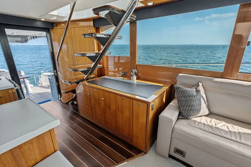 Slide: The Image of Luxurious interior of 2016 Maritimo M58 yacht with ocean view and modern furnishings. - 34