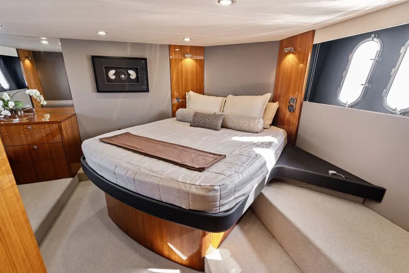 Slide: The Image of Luxurious cabin interior of 2016 Maritimo M58 yacht with elegant bedding and decor. - 40