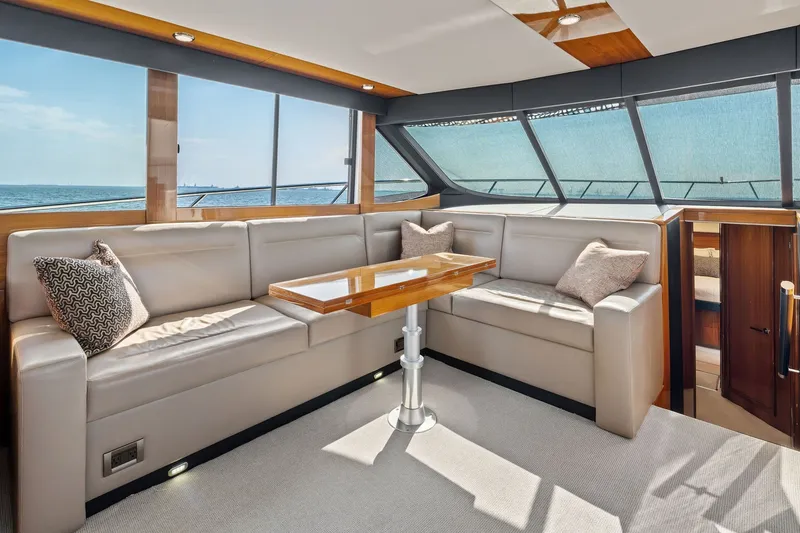 Slide: The Image of Luxurious interior of 2016 Maritimo M58 yacht with plush seating and ocean view. - 33