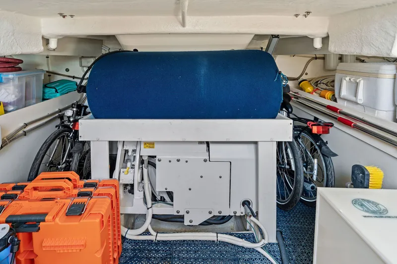 Slide: The Image of Storage area of a 2016 Maritimo M58 yacht with bicycles and equipment. - 60