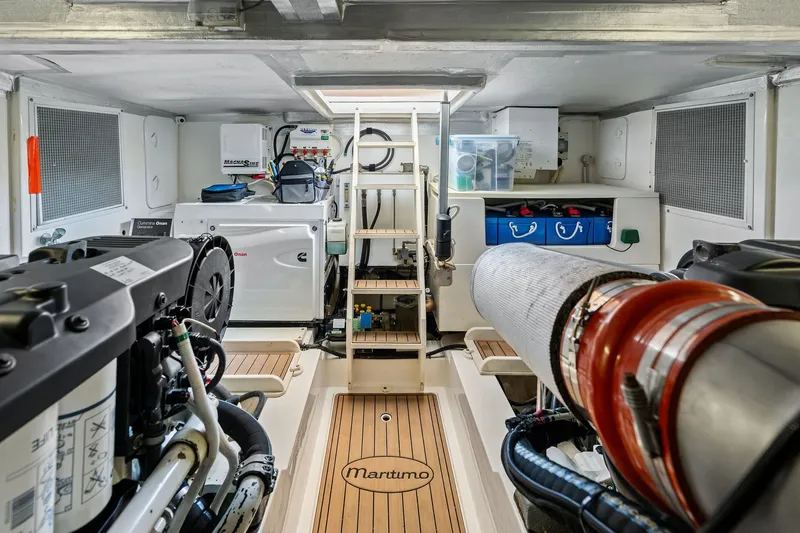Slide: The Image of Engine room of 2016 Maritimo M58 yacht with Cummins Onan generator and equipment. - 57