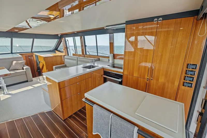 Slide: The Image of Luxurious interior of 2016 Maritimo M58 yacht with modern kitchen and seating area. - 35