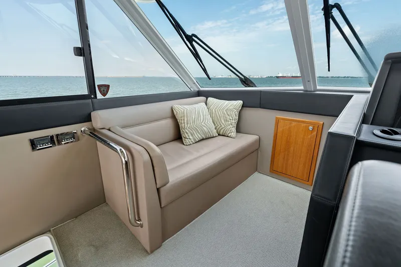 Slide: The Image of Luxurious interior of 2016 Maritimo M58 yacht with comfortable seating and ocean view. - 27