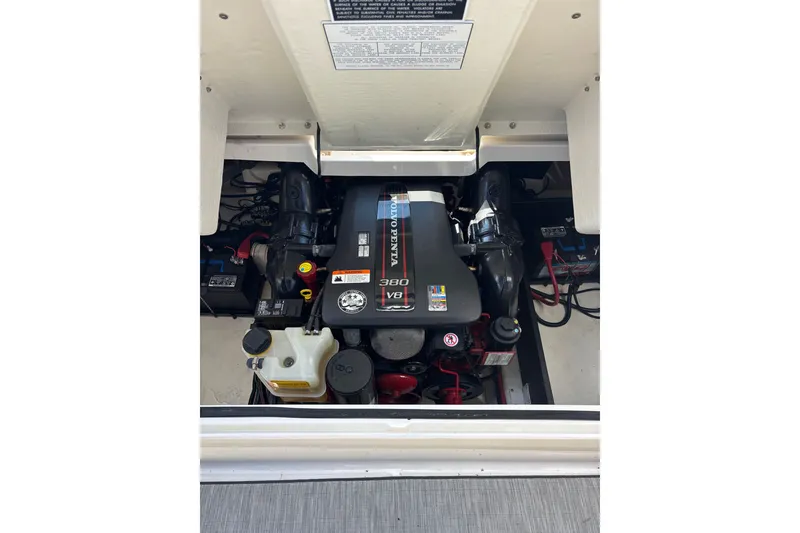 Slide: The Image of Engine compartment of a 2017 Regal 2800 Bowrider boat, featuring a Volvo Penta engine. - 24