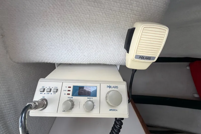 Slide: The Image of Marine radio system in a 1999 Pursuit 2460 Denali boat cabin. - 29
