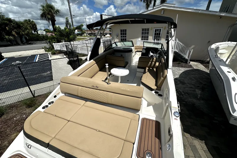 Slide: The Image of 2018 Sea Ray SDX 270 Outboard boat with spacious seating and sleek design. - 11