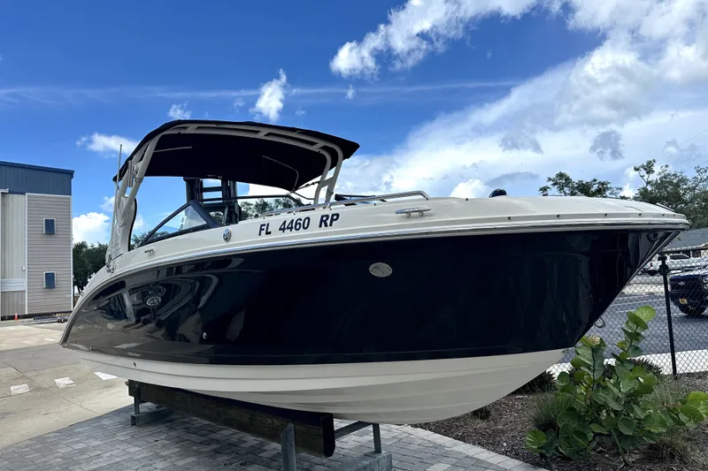 The Image of 2018 Sea Ray SDX 270 Outboard boat on display, featuring sleek design and modern amenities. - 0