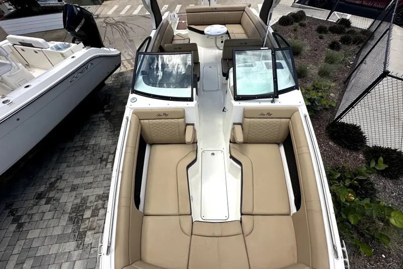 Slide: The Image of 2018 Sea Ray SDX 270 Outboard boat with spacious seating and sleek design. - 7