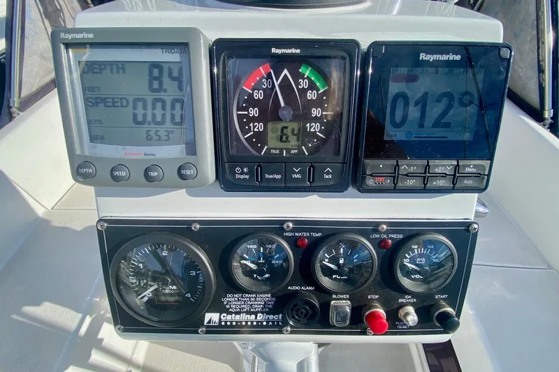 Slide: The Image of Control panel of a 2007 Catalina 309 sailboat with Raymarine instruments. - 54