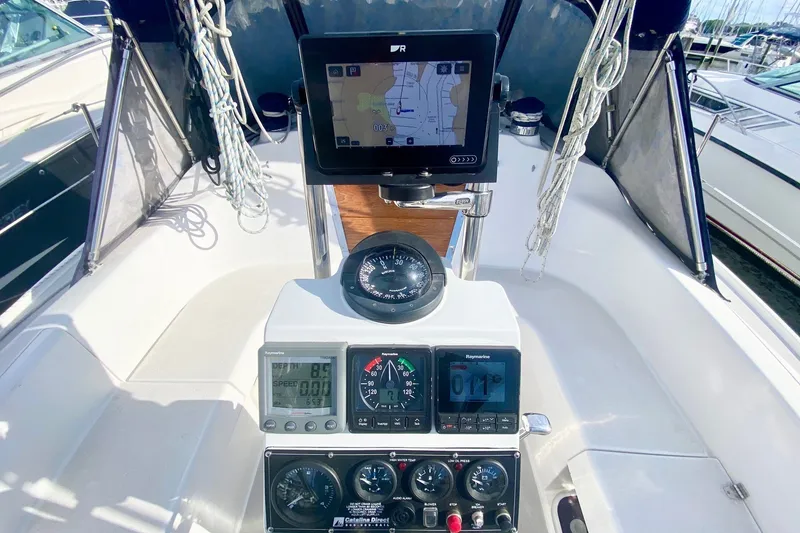 Slide: The Image of Cockpit of 2007 Catalina 309 sailboat with navigation instruments and compass. - 53