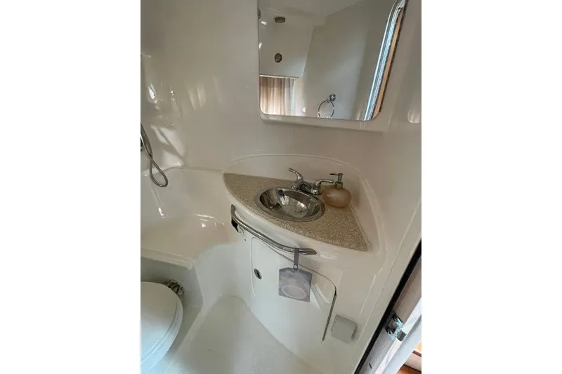 Slide: The Image of Bathroom interior of 2007 Chaparral Signature 330 yacht with sink and mirror. - 15
