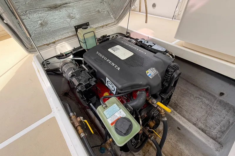 Slide: The Image of Engine compartment of a 2004 Hunt Yachts Surfhunter 29 with Volvo Penta engine. - 31