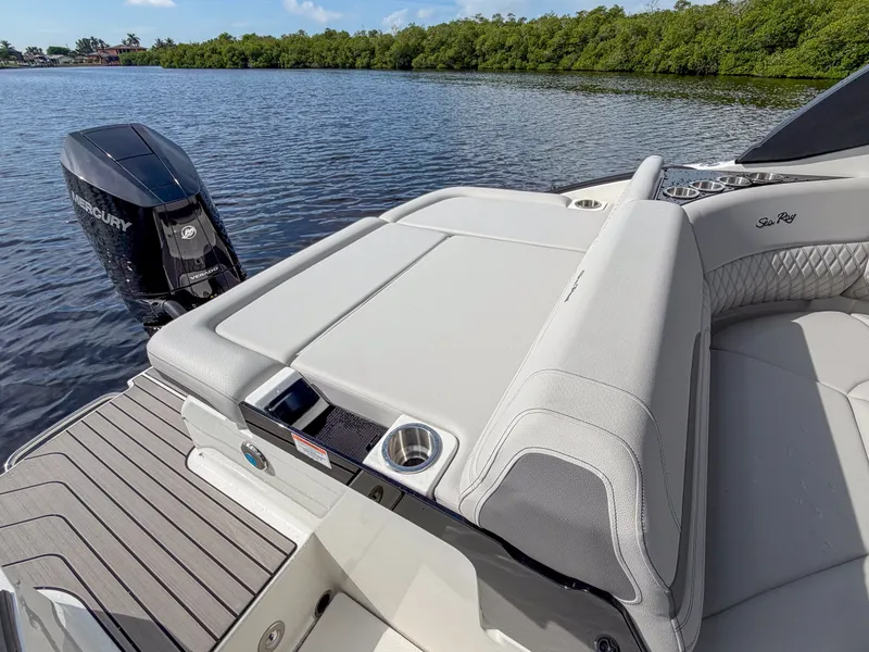 Slide: The Image of The image shows the stern of a 2027 Sea Ray SLX 260 Outboard with luxurious seating. - 18