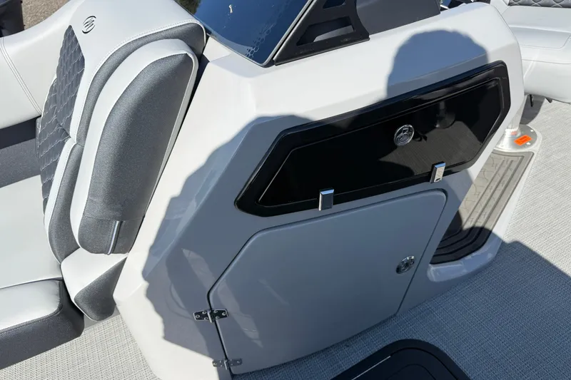 Slide: The Image of 2027 Manitou Encore 25 RF Dual boat interior with sleek seating and modern console design. - 12