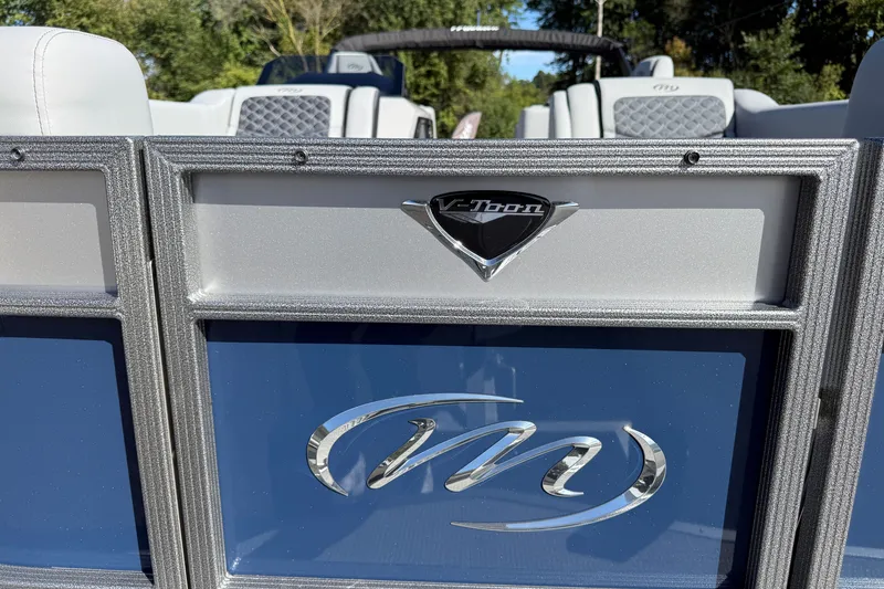 Slide: The Image of 2027 Manitou Encore 25 RF Dual pontoon boat with V-Toon technology, close-up view. - 6