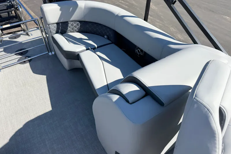 Slide: The Image of Luxurious seating on 2027 Manitou Encore 25 RF Dual pontoon boat, featuring elegant upholstery. - 15