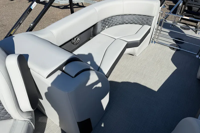 Slide: The Image of Luxurious seating on 2027 Manitou Encore 25 RF Dual pontoon boat, featuring elegant upholstery. - 16