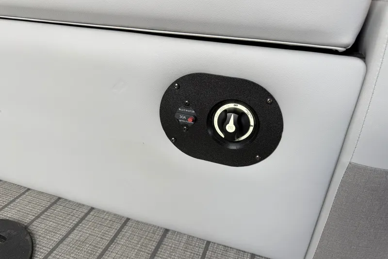 Slide: The Image of Control panel on 2027 Manitou Encore SL 25 boat, featuring a 30A switch. - 26