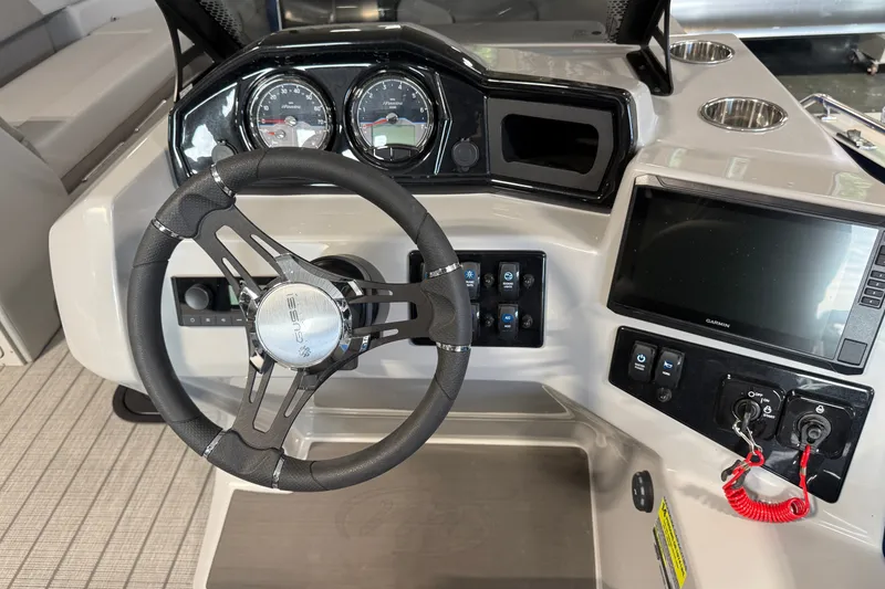Slide: The Image of Steering console of 2027 Manitou Encore SL 25 with modern controls and display. - 16