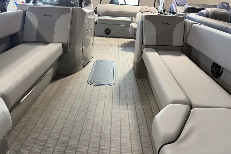 Slide: The Image of 2027 Manitou Encore SL 25 interior with spacious seating and modern design. - 17