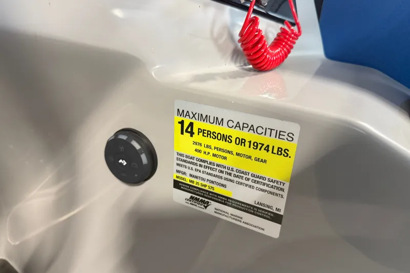 Slide: The Image of 2027 Manitou Encore SL 25 capacity label, maximum 14 persons or 1974 lbs. - 20