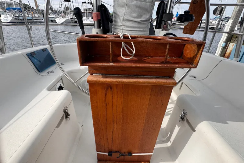 Slide: The Image of Cockpit of a 1991 CS 34 sailboat with wooden helm and steering wheel. - 17