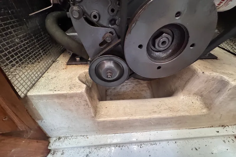 Slide: The Image of Close-up of a 1991 CS 34 engine component in a mechanical setting. - 38