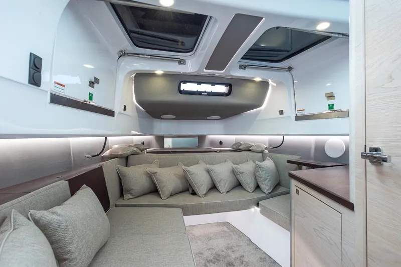 Slide: The Image of Luxurious interior of 2024 Axopar 45 XC Cross Cabin with plush seating and modern design. - 15