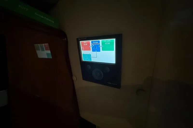 Slide: The Image of Control panel display inside 2012 Regal 35 Sport Coupe boat cabin. - 28