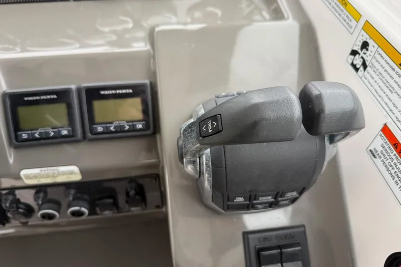 Slide: The Image of Control panel of 2012 Regal 35 Sport Coupe with Volvo Penta displays and throttle. - 26