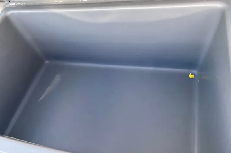Slide: The Image of Empty storage compartment in 2027 Tracker Bass Tracker Classic CC boat. - 15