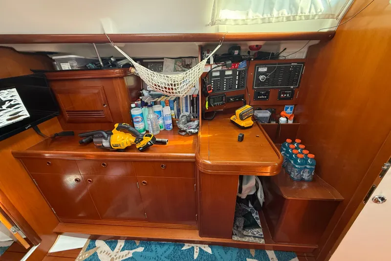 Slide: The Image of Interior of 2003 Beneteau Oceanis Clipper 393 yacht with navigation equipment and storage. - 16